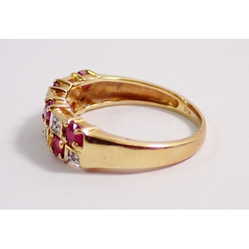 287 - A 9ct gold ring set seven rubies and seven illusion set diamonds, size K, 2.3g
