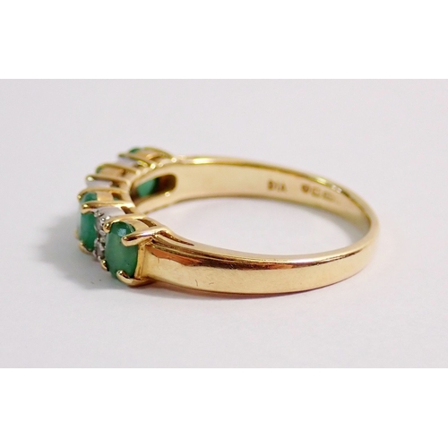 288 - A 9ct gold ring set four small emeralds interspered with six small diamonds, 2.2g, size L