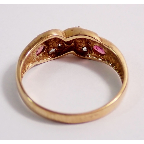 290 - A 9 carat gold ring set rubies and white stones, 2.8g, size N to O