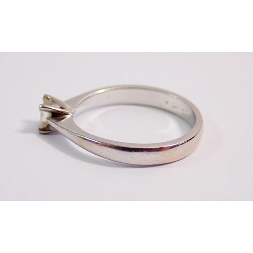 294 - A platinum solitaire ring set princess cut diamond, size K, 2.9g