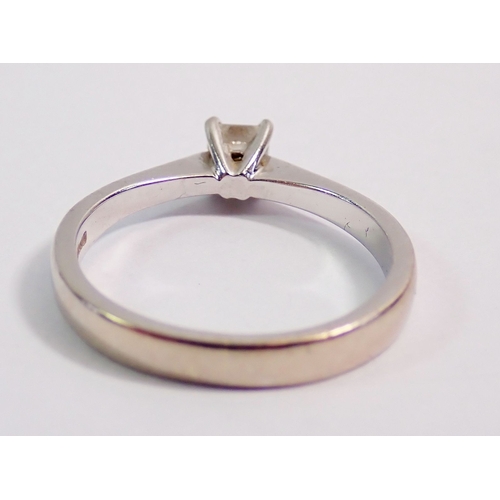 294 - A platinum solitaire ring set princess cut diamond, size K, 2.9g