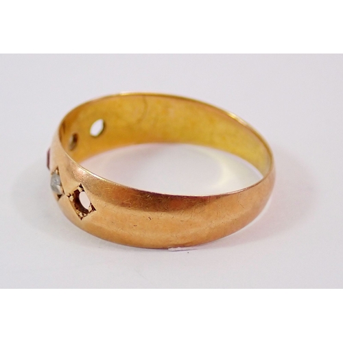 301 - A 15ct gold gypsy ring set ruby and two chip diamonds, (two stones defficient), 1.8g, size L