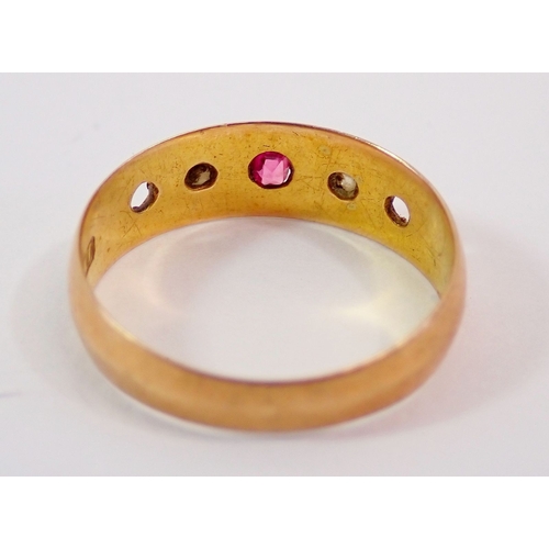 301 - A 15ct gold gypsy ring set ruby and two chip diamonds, (two stones defficient), 1.8g, size L