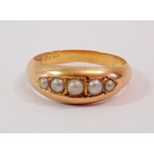 302 - A Victorian 15ct gold ring set five seed pearls, 1.2g, size K
