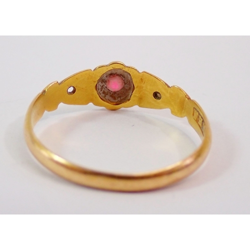 304 - A Victorian 18ct gold ring set ruby and chip diamond, one diamond deficient, size O, 1.8g