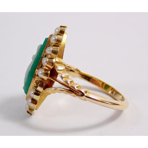 306 - An 18 carat gold marquise pearl and green cameo ring, 2.1 x 1cm, size L-M, 4.2g