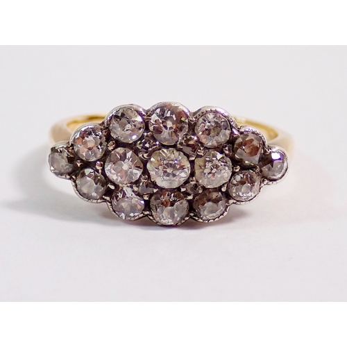310 - An 18 carat gold diamond set oval ring, size M, 3g, 1.8 x 1cm