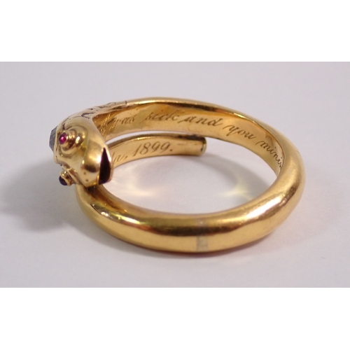 311 - A Victorian gold serpent or snake ring set diamonds to head and ruby eyes, engraved to interior 'I w... 