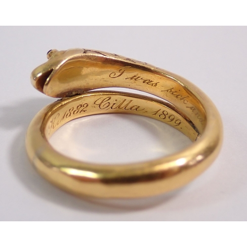 311 - A Victorian gold serpent or snake ring set diamonds to head and ruby eyes, engraved to interior 'I w... 