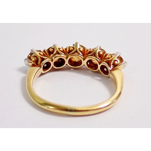 312 - An 18 carat gold five stone diamond ring, size K, 2.8g