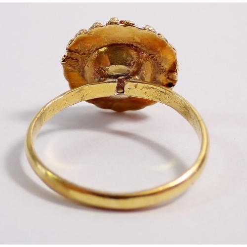 316 - An 18 carat gold flower form ring - not marked but tested, 2.7g, size L