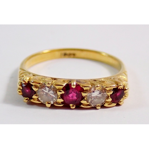 317 - An 18 carat gold ring set three rubies and two diamonds, 3.9g, size M, 42cm