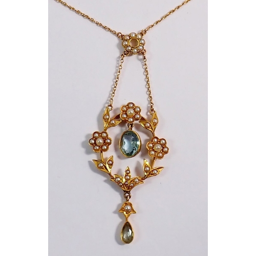 319 - An Edwardian 9ct gold pendant necklace set floral pearl clusters and aquamarine drops, drop 6.2cm, c... 