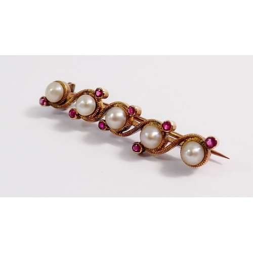 329 - A Victorian 15 carat gold pearl and ruby wave set bar brooch, 3.7g, 3.7cm long