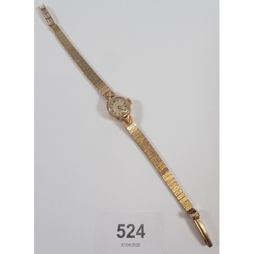 524 - A 9 carat gold Rotary ladies wristwatch and 9 carat gold strap, total weight 18.6g