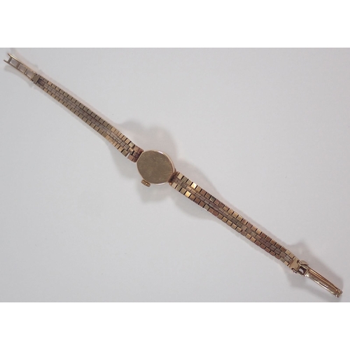 524 - A 9 carat gold Rotary ladies wristwatch and 9 carat gold strap, total weight 18.6g