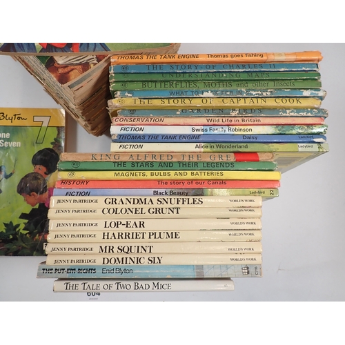 604 - A group of childrens books including Ladybird books, The Schoolgirls Own Library magazines etc.