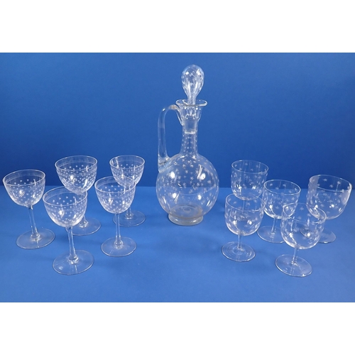 125 - A group of antique drinking glasses and decanter all engraved stars