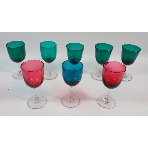 127 - Eight various antique green and cranberry drinking glasses, 12.5cm tall