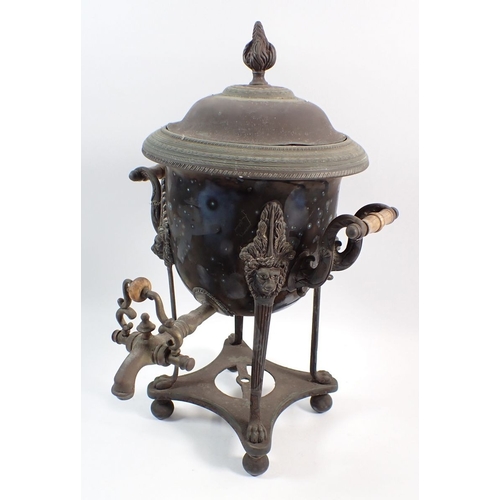 134 - A silver plated samovar with lion mask decoration on paw feet, 36.5cm high