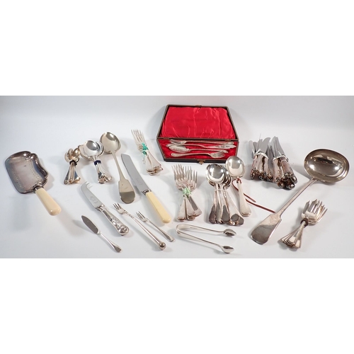 139 - A box of silver plated cutlery in sets, including Old English pattern, Victorian high tea set etc