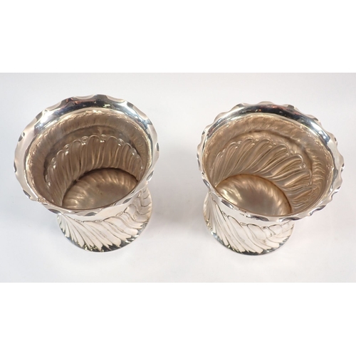 151 - A pair of silver spiral gadrooned bottle holders or coasters by Atkin Bros, Sheffield 1892/1896, 11c... 