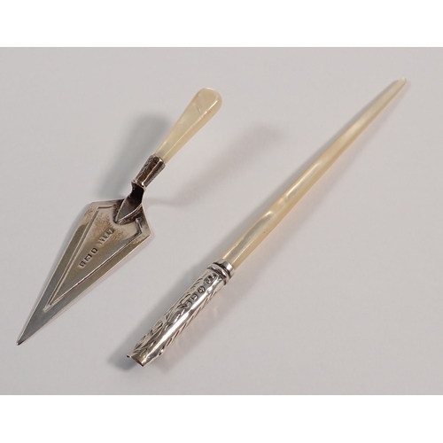 153 - A silver trowel form bookmark, 11cm long and dip pen with mother of pearl handle