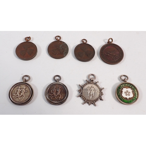 170 - A collection of sports medals, four being silver, 54g