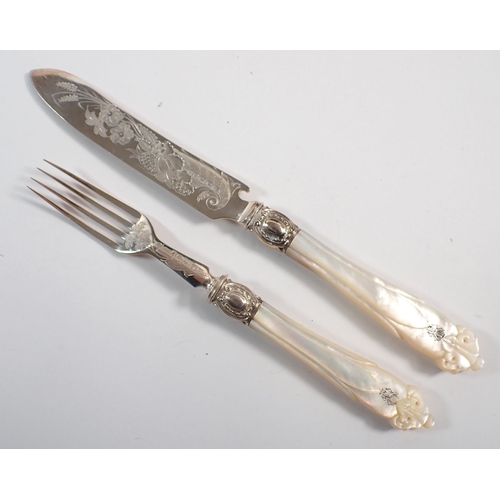 187 - A Victorian silver and mother of pearl set of twelve fruit knives and forks with engraved decoration... 