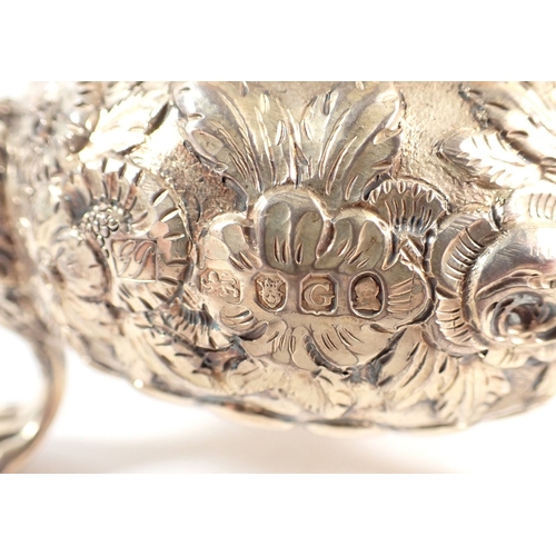 199 - A fine quality Regency silver gilt sugar bowl with floral repousse decoration, all on triple lion pa... 