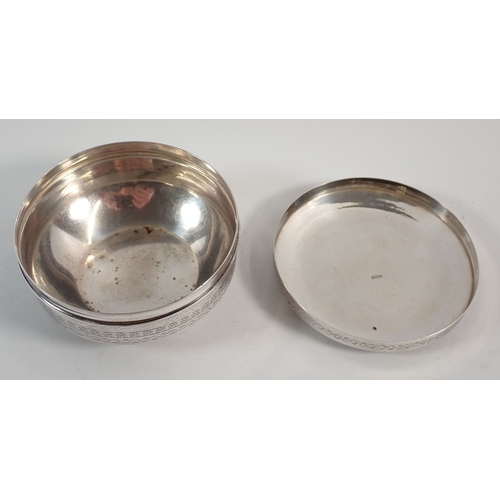 206 - A Eastern silver circular box with engraved decoration, (tested as silver) 10.5cm wide, 170g
