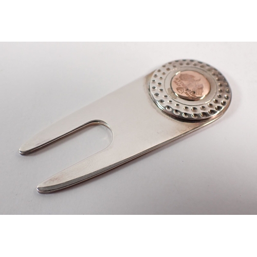 208 - A Clogau silver and gold Ryder Cup pitch repairer, 5cm long - boxed, 17g