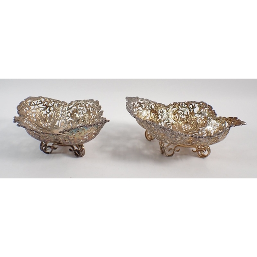 230 - A pair of Victorian silver James Dixon & Sons baskets with pierced and embossed decoration, Sheffiel... 