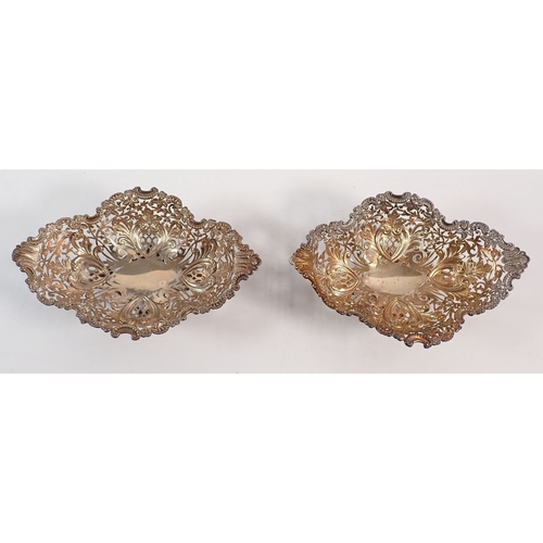 230 - A pair of Victorian silver James Dixon & Sons baskets with pierced and embossed decoration, Sheffiel... 
