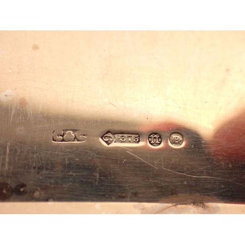 232 - A 9 carat gold engine turned cigarette case with Greek key boarder, 11.5cm wide, 141g