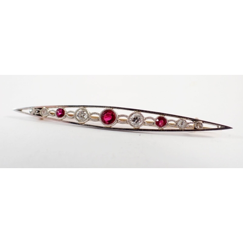 234 - An Edwardian ruby and diamond bar brooch set in open work white and yellow gold, 5.5cm long - in ori... 
