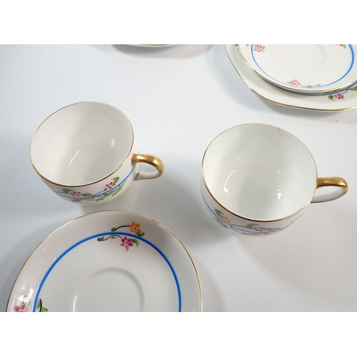 24 - An Edwardian Carlton china tea set No. 4660 with floral decoration comprising six cups and saucers, ... 