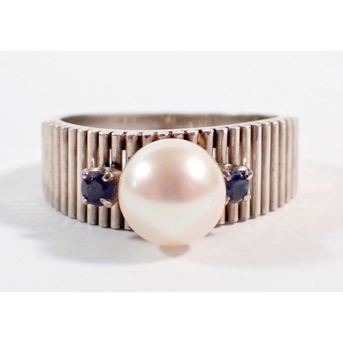 240 - A vintage 14k white gold ring set pearl flanked by two small sapphires on reeded band, size L to M, ... 