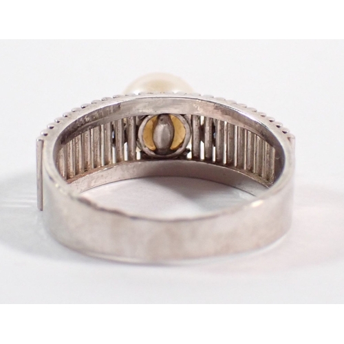 240 - A vintage 14k white gold ring set pearl flanked by two small sapphires on reeded band, size L to M, ... 