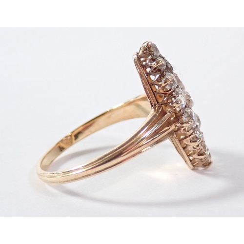250 - An 18 carat gold marquise diamond ring, size N-O, 3.4g