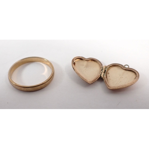 290 - A 9ct gold wedding band size I-J 1.2g and a 9ct gold heart locket 1g