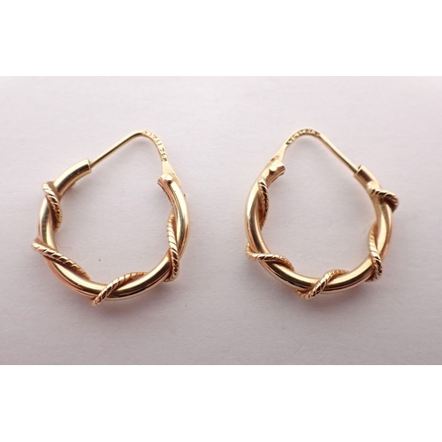 291 - A pair of Italian 14k gold hoop earrings with rope detailing, 2.4g