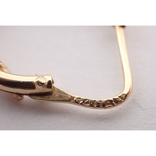 291 - A pair of Italian 14k gold hoop earrings with rope detailing, 2.4g