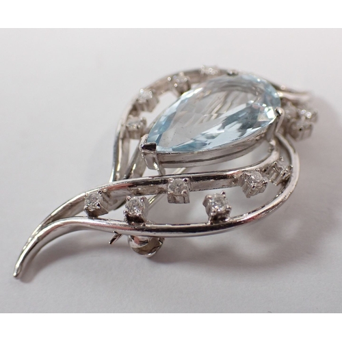293 - A 14k white gold aquamarine and diamond spray brooch, 1.5cm long, 7.2g