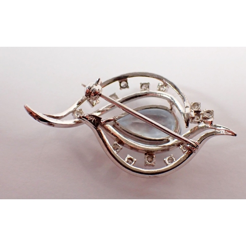 293 - A 14k white gold aquamarine and diamond spray brooch, 1.5cm long, 7.2g