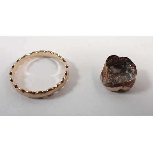 297 - A 9 carat gold ring, size N, 1.7g and a gold tooth, 2.4g