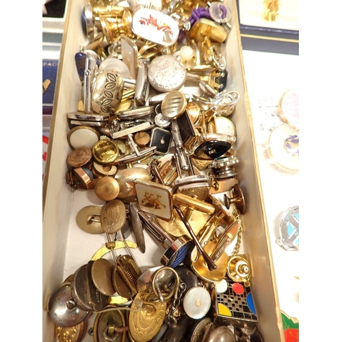 370 - A box of cufflinks, enamel badges, tie clips etc.