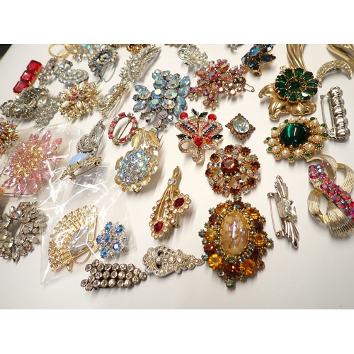 370 - A box of cufflinks, enamel badges, tie clips etc.