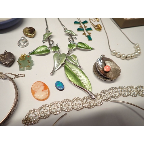 374 - A collection of necklaces, pendants etc. including 9 carat gold stone set pendant, Indian silver and... 