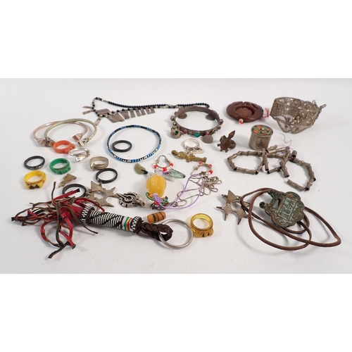 406 - A box of Indian and African jewellery including white metal etc.